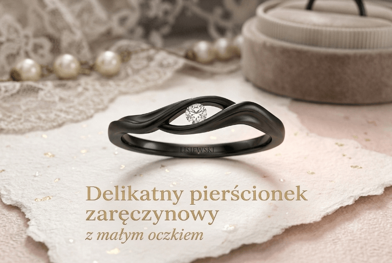 Delikatny pierścionek zaręczynowy z małym oczkiem